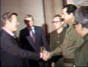 Donald Rumsfeld meeting Saddām on 19 December – 20 December 1983. Rumsfeld visited again on 24 March 1984; the same day the UN released a report that Iraq had used mustard and Tabun nerve gas against Iranian troops.  The NY Times reported from Baghdad on 29 March 1984, that "American diplomats pronounce themselves satisfied with Iraq and the U.S., and suggest that normal diplomatic ties have been established in all but name." NSA Archive Source 