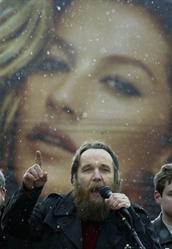 Alexander Dugin, the leader of the Eurasian Movement, speaks during a rally of Russian nationalist groups in central Moscow, Sunday, April 8, 2007, with a billboard in the background. Several hundred young supporters of Russian nationalist groups rallied under heavy guard in downtown Moscow Sunday, calling for the resurrection of the Soviet empire. Under Russia&#039;s President Vladimir Putin, the Kremlin has taken an increasingly assertive posture on the former Soviet nations and bristled at what it described as the U.S. expansion into its sphere of interests, the policy popular with the public, nostalgic about the Soviet Union&#039;s global clout and prestige. From AP Photo by IVAN SEKRETAREV.