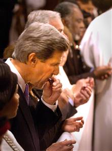 IMAGE: John Kerry takes communion