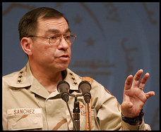 Lt. Gen. Ricardo Sanchez, the U.S. military commander in Iraq  gestures during press conference in Baghda Saturday Nov. 29, 2003. Sanchez said that the United States is boosting the number of infantry soldiers in Iraq and moving from a force based on tanks and heavy armored vehicles to one specializing in urban assault raids, using lighter vehicles and intelligence. (AP Photo/Dusan Vranic)
