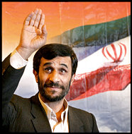Iran's President-elect Mahmoud Ahmadinejad waves to journalists at a news conference in Tehran June 26, 2005. Ahmadinejad said his government would be one of 