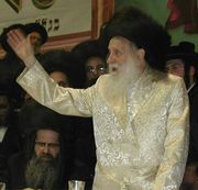 Grand Rebbe Moses Teitelbaum of Satmar dressed in a special Shabbat bekishe. Next to him is his son Zalman Leib Teitelbaum
